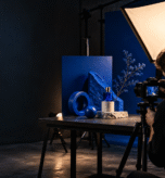 Content creator producing a premium digital campaign in a modern studio.